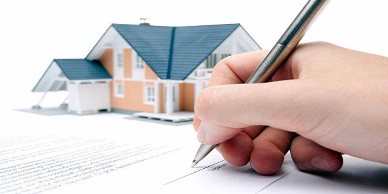 signing the deal to buy a home